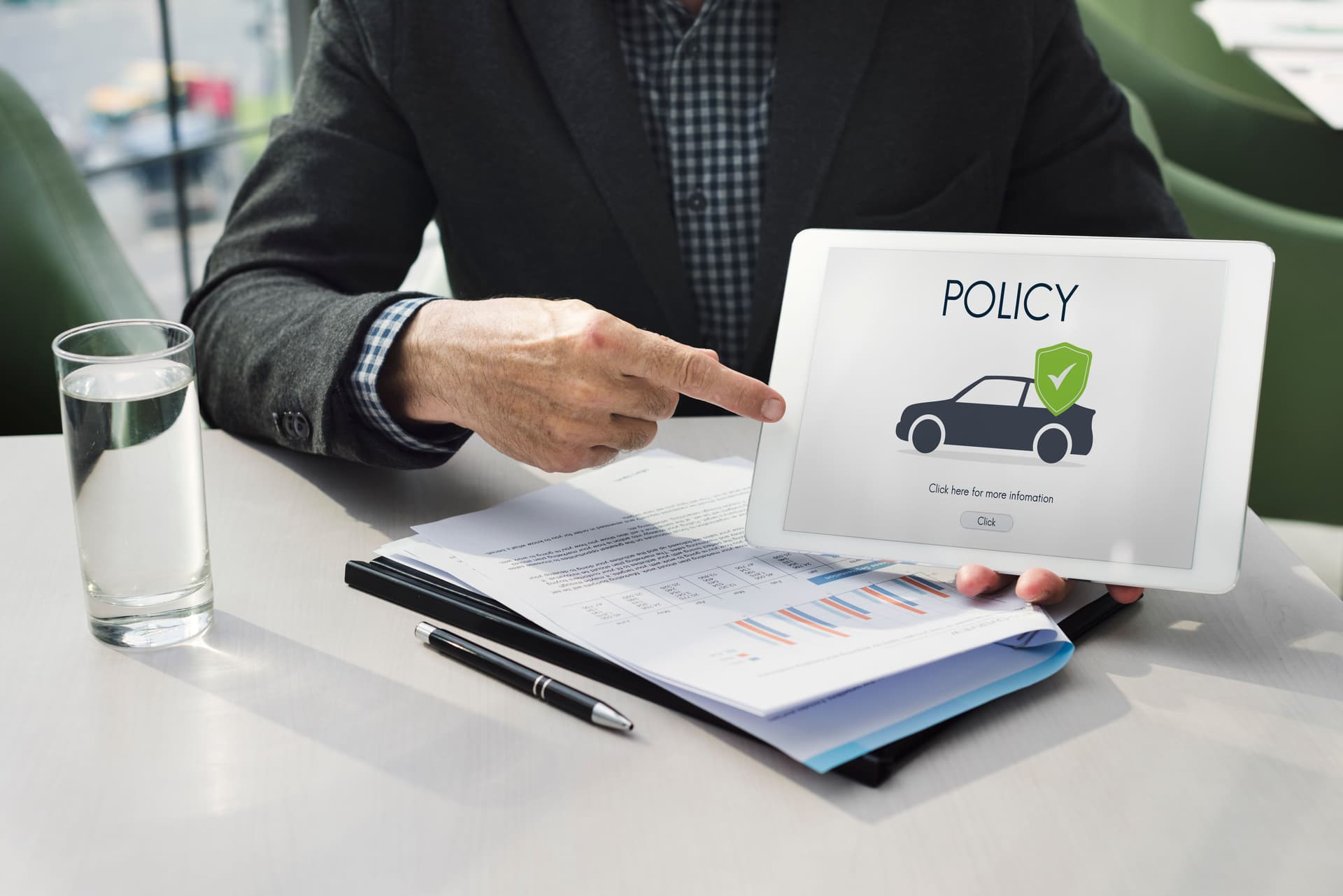 insuarance policy being reviews by an insurance agent