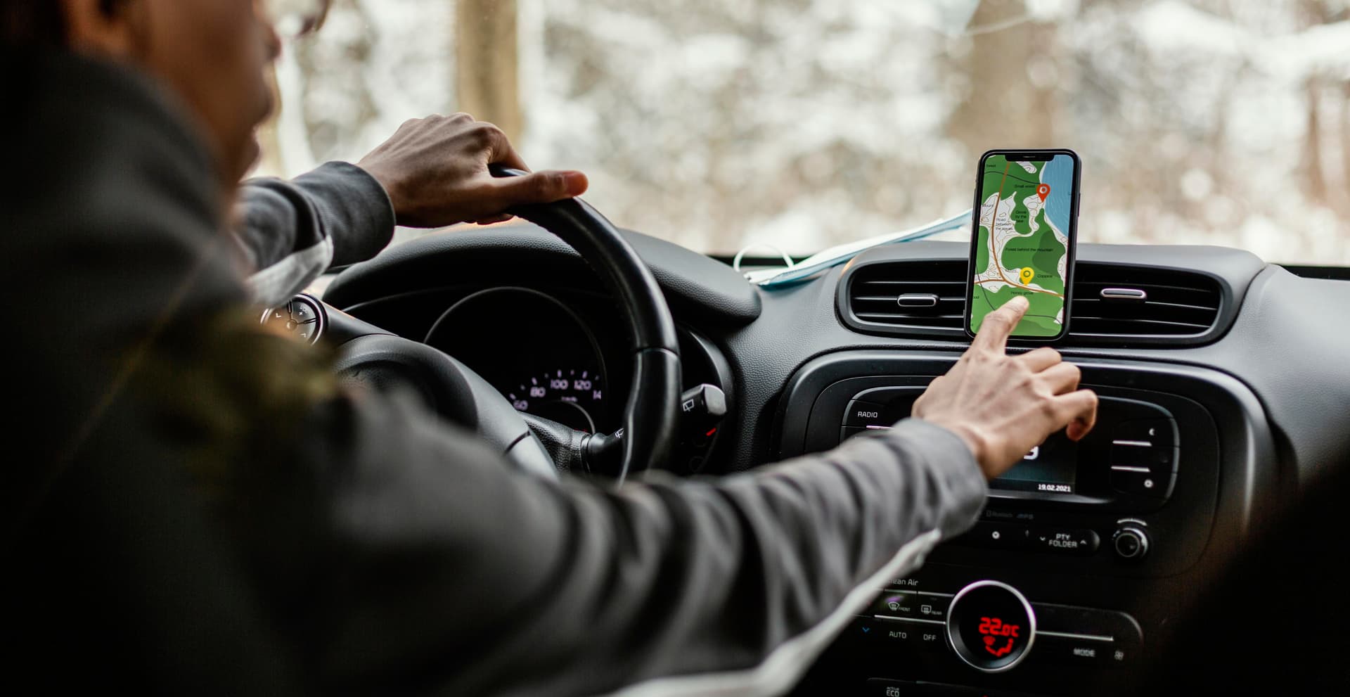 cab driver using ride hailing app for direction